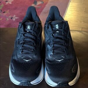 Hoka Clifton 10.  Black and White Athletic Shoes